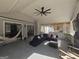 Inviting sunroom featuring a ceiling fan, comfortable seating and lots of natural light at 5802 Bay Pointe Sound Nw, Acworth, GA 30101