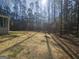 Large backyard with views of the woods at 5802 Bay Pointe Sound Nw, Acworth, GA 30101