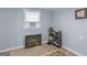 Cozy room featuring a window AC unit, carpet, and closet space at 1202 Coan Dr, Locust Grove, GA 30248