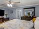 Bright bedroom with a large window, and ceiling fan at 1202 Coan Dr, Locust Grove, GA 30248