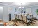 Bright dining room with table and chairs at 1202 Coan Dr, Locust Grove, GA 30248
