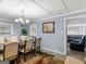 Open dining room with plenty of space at 1202 Coan Dr, Locust Grove, GA 30248