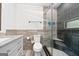 Bathroom featuring a glass shower enclosure, modern tiles, a vanity with marble countertop, and contemporary fixtures at 280 Nutt Dr, Locust Grove, GA 30248