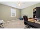 Bedroom featuring plush carpeting, neutral walls, ceiling fan, and a large window at 280 Nutt Dr, Locust Grove, GA 30248