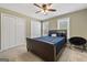 Bedroom with a large bed, ceiling fan, and double closets with lots of space at 280 Nutt Dr, Locust Grove, GA 30248