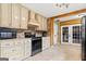 Well-equipped kitchen with modern appliances and tile flooring at 280 Nutt Dr, Locust Grove, GA 30248