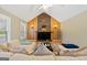 Inviting living room featuring vaulted ceilings, fireplace, and comfortable seating at 280 Nutt Dr, Locust Grove, GA 30248