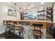 Basement bar area featuring wood counter and shelving at 3149 Hidden Falls Ne Dr, Buford, GA 30519