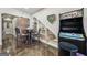 Basement area with arcade game and shelving at 3149 Hidden Falls Ne Dr, Buford, GA 30519