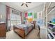 Bedroom with natural light and ceiling fan at 3149 Hidden Falls Ne Dr, Buford, GA 30519