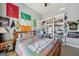 Bedroom with a built in bookcase and natural light at 3149 Hidden Falls Ne Dr, Buford, GA 30519