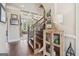 Inviting foyer with hardwood floors, coffered ceiling, staircase, and view of the living room at 3149 Hidden Falls Ne Dr, Buford, GA 30519