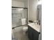 Updated bathroom with tiled shower/tub combo and vanity at 103 Greenwood Dr, Stockbridge, GA 30281