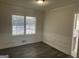 Traditional dining room with wainscotting and hardwood flooring at 103 Greenwood Dr, Stockbridge, GA 30281