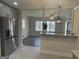 View from kitchen shows dining room and living room at 103 Greenwood Dr, Stockbridge, GA 30281