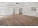 Spacious bedroom with hard wood floors, fan and walk in closet at 117 Spring St, Stockbridge, GA 30281