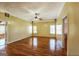 Bright, open primary bedroom with pristine hardwood floors, offering a comfortable and stylish retreat at 132 Westmont Way, Tyrone, GA 30290