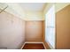 A closet with metal shelving on neutral color walls and hardwood floors at 132 Westmont Way, Tyrone, GA 30290