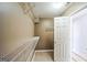 Walk-in closet features sturdy wire shelving at 132 Westmont Way, Tyrone, GA 30290