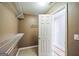 Walk-in closet featuring metal shelving and neutral paint color walls at 132 Westmont Way, Tyrone, GA 30290