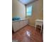 Functional laundry room with tiled floor and convenient sink at 132 Westmont Way, Tyrone, GA 30290