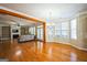Open living area with fireplace, built-in shelving, and ample natural light at 132 Westmont Way, Tyrone, GA 30290