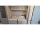 Functional laundry area featuring a side-by-side washer and dryer setup in a clean, organized space at 1901 E Farris Ave, East Point, GA 30344