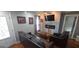 Cozy living room with a stone fireplace, hardwood floors, and ample seating at 1901 E Farris Ave, East Point, GA 30344