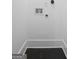 A dedicated space for a washer and dryer with hookups on a white wall at 2377 Beecher Sw Rd, Atlanta, GA 30311