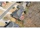 Aerial view of the back of a home with a deck and outdoor entertaining space at 3967 Bellingrath Main Nw, Kennesaw, GA 30144