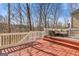 Inviting outdoor deck featuring a comfortable seating area overlooking a wooded backyard at 3967 Bellingrath Main Nw, Kennesaw, GA 30144