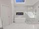 Spacious bathroom with standalone tub, glass shower, and a built-in fireplace at 3967 Bellingrath Main Nw, Kennesaw, GA 30144