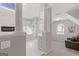 Modern bathroom with walk-in shower and bathtub across from a bedroom seating area at 3967 Bellingrath Main Nw, Kennesaw, GA 30144