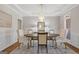 Elegant dining room with hardwood floors, a chandelier, and ample seating at 3967 Bellingrath Main Nw, Kennesaw, GA 30144