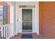 Elegant front door with white trim and brick exterior at 3967 Bellingrath Main Nw, Kennesaw, GA 30144