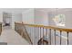 Spacious hallway featuring a decorative chandelier and rod iron banister overlooking the staircase at 3967 Bellingrath Main Nw, Kennesaw, GA 30144
