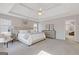 The main bedroom features a tray ceiling, ensuite bathroom, and a sitting area at 3967 Bellingrath Main Nw, Kennesaw, GA 30144