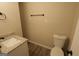 Tastefully designed half bath featuring modern sink and commode at 263 Banberry Se Dr, Atlanta, GA 30315