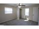Comfortable bedroom with ceiling fan, carpet floors and a closet at 263 Banberry Se Dr, Atlanta, GA 30315