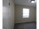 Cozy bedroom with soft carpet, ample natural light, and neutral paint at 263 Banberry Se Dr, Atlanta, GA 30315