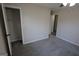 Neutral carpeted bedroom with a closet and ceiling fan at 263 Banberry Se Dr, Atlanta, GA 30315