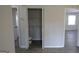 Hallway and closet with white walls, recessed lighting, and luxury vinyl plank flooring at 263 Banberry Se Dr, Atlanta, GA 30315