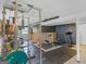 Basement gym with weight rack, gym equipment, rubber floor, and windows at 71 Russell Rd, Mcdonough, GA 30252