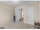 Bedroom with fresh paint, neutral carpet, and natural light at 71 Russell Rd, Mcdonough, GA 30252