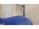 Bedroom featuring carpet, bed, and doors at 71 Russell Rd, Mcdonough, GA 30252