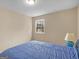 Bedroom featuring a window, carpet, and bed at 71 Russell Rd, Mcdonough, GA 30252