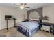A bedroom featuring carpet, ceiling fan, bed and desk at 71 Russell Rd, Mcdonough, GA 30252