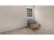 Unfurnished bedroom featuring a window and carpet at 71 Russell Rd, Mcdonough, GA 30252