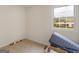 Bedroom featuring neutral carpet, natural light, and ample space at 71 Russell Rd, Mcdonough, GA 30252