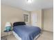Bedroom featuring a window, carpet, and bed at 71 Russell Rd, Mcdonough, GA 30252